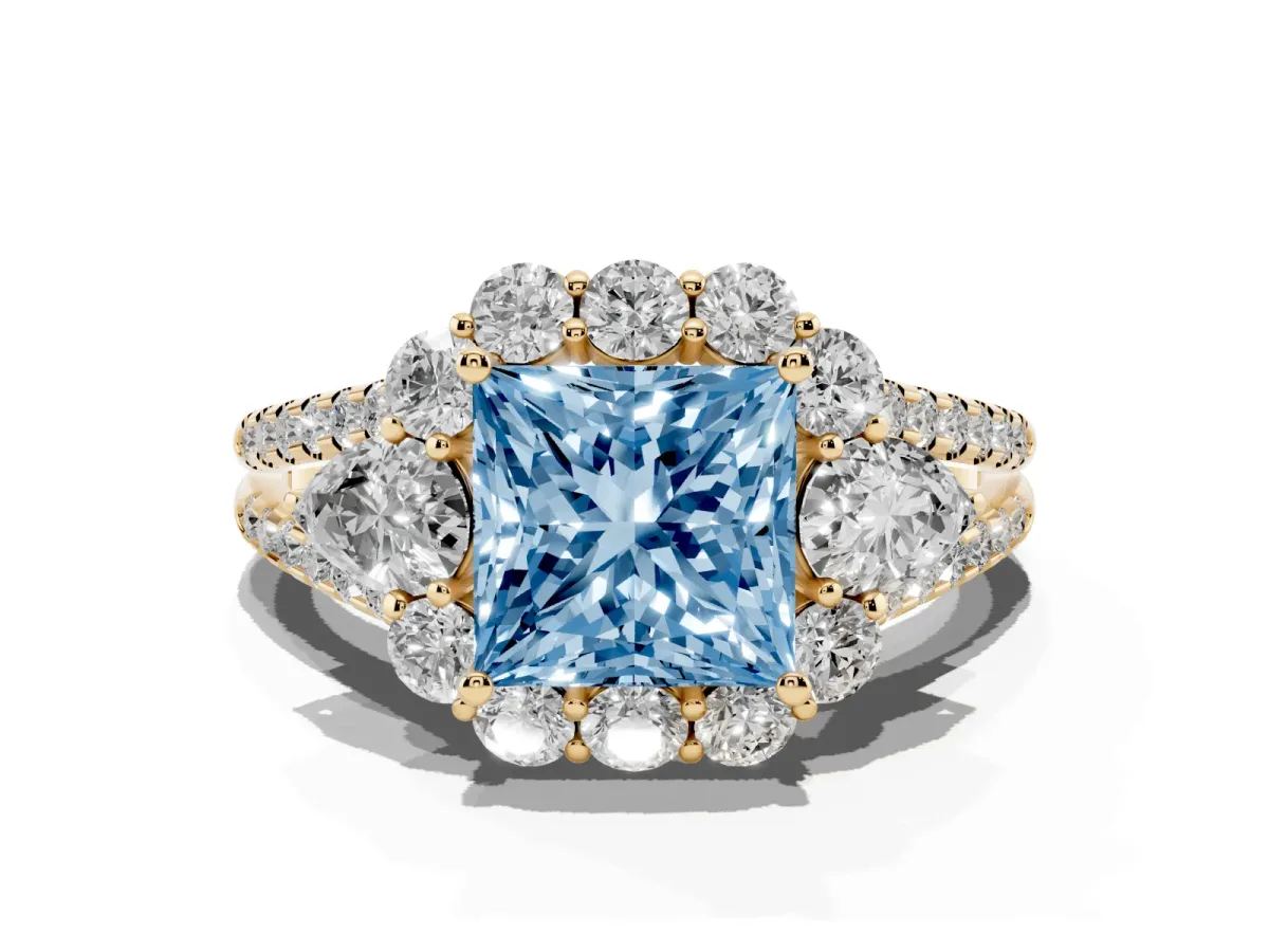 Fancy Blue Princess Cut Halo Split Shank Diamond Engagement Ring with Prong Setting Yellow gold