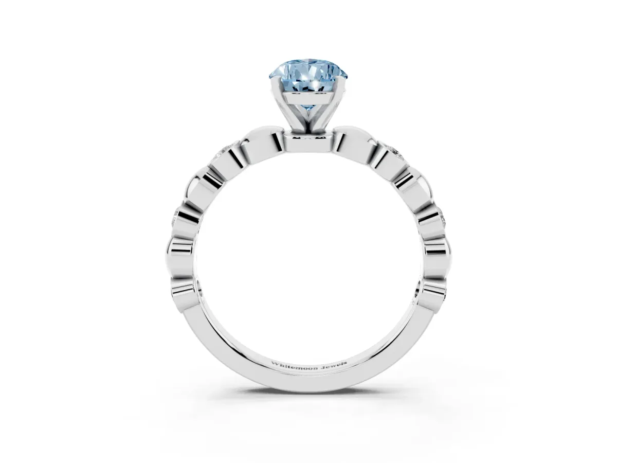 Fancy Blue Pear Cut Solitaire Bezel-Set Diamond Ring with Beaded Band and Four-Prong Setting Silver