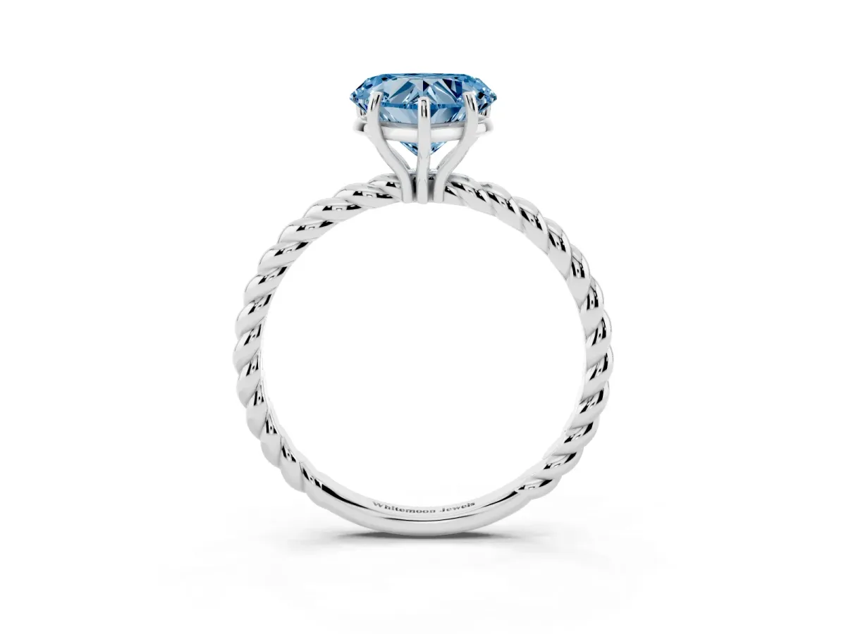 Fancy Blue Heart Cut Solitaire Twist Band Ring with Four-Prong Setting Platinum