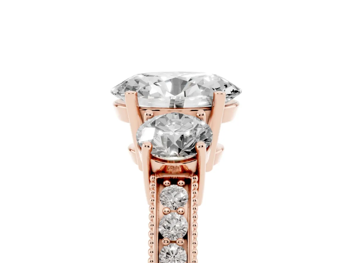Oval Cut Three-Stone Diamond Ring with Pavé Band and Four-Prong Setting Rose gold