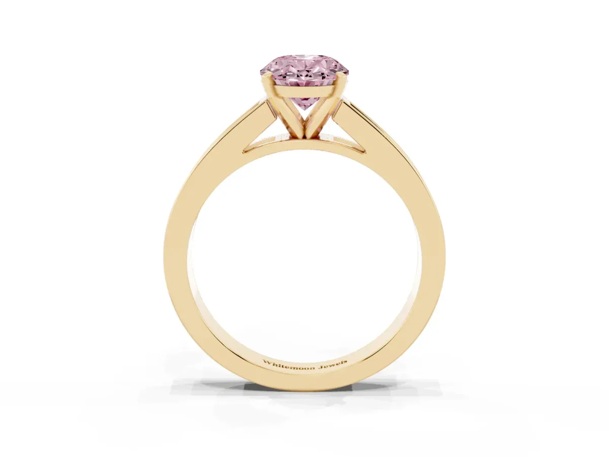 Fancy Pink Oval Cut Solitaire Diamond Ring with Channel-Set Band and Four-Prong Setting Yellow gold