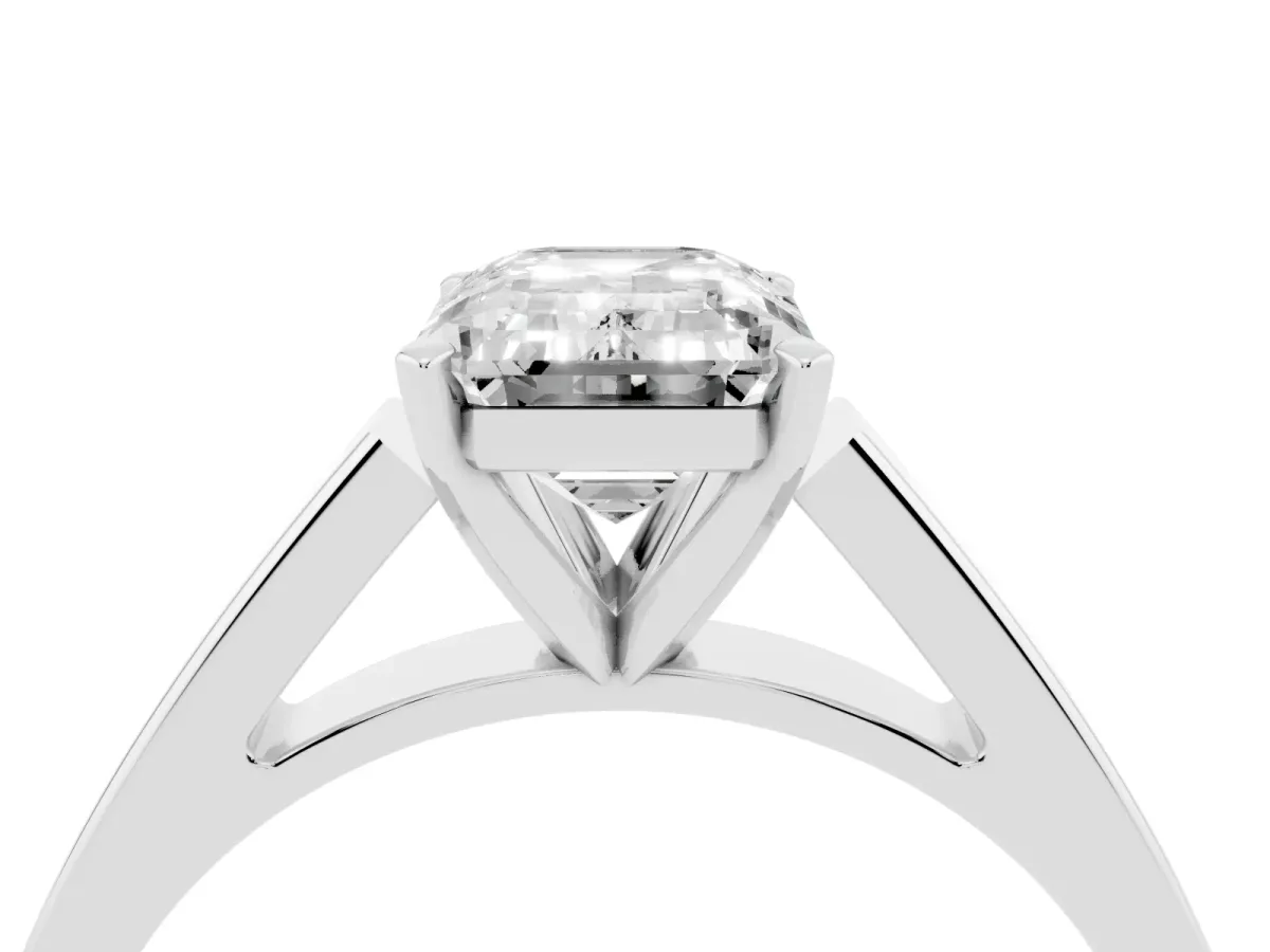 Emerald Cut Solitaire Engagement Ring with Four-Prong Setting and Tapered Band Silver