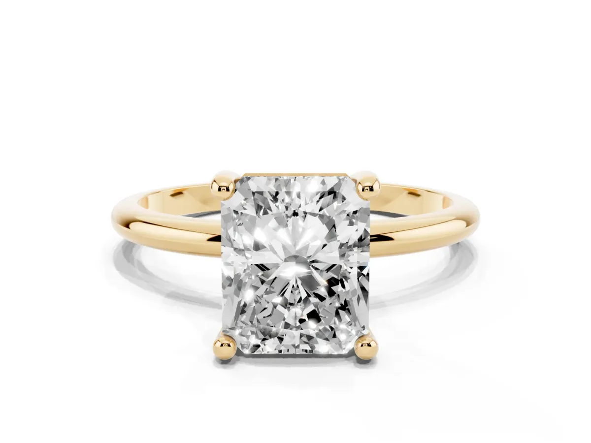 Radiant Cut Solitaire Diamond Ring with 4-Prong Setting on a Classic Band Yellow gold