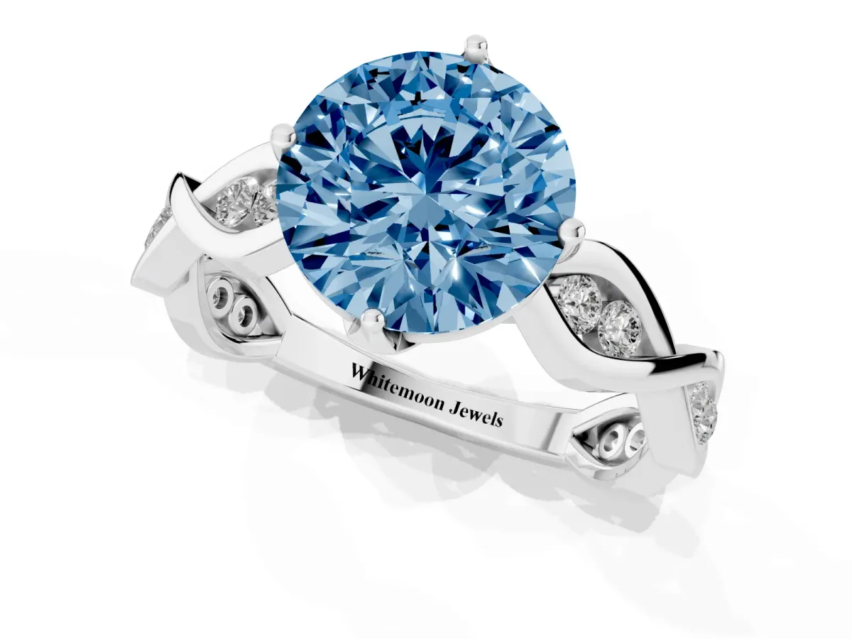 Fancy Blue Round Cut Solitaire Twist Band with Leaf Prong Setting Platinum