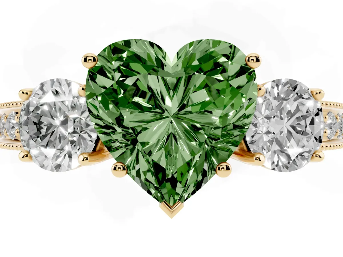 Fancy Green Heart Cut Three-Stone Diamond Ring with Pavé Band and Four-Prong Setting Yellow gold
