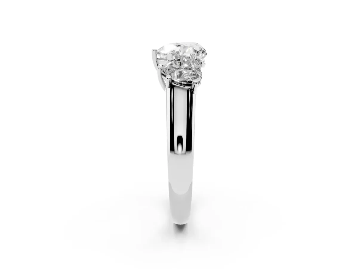 Heart Cut Three-Stone Diamond Ring with Prong Setting on a Classic Band White gold