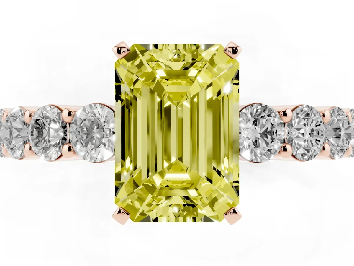 Fancy Yellow Emerald Cut Diamond Solitaire Ring with Shared Prong Round Side Stones Rose gold