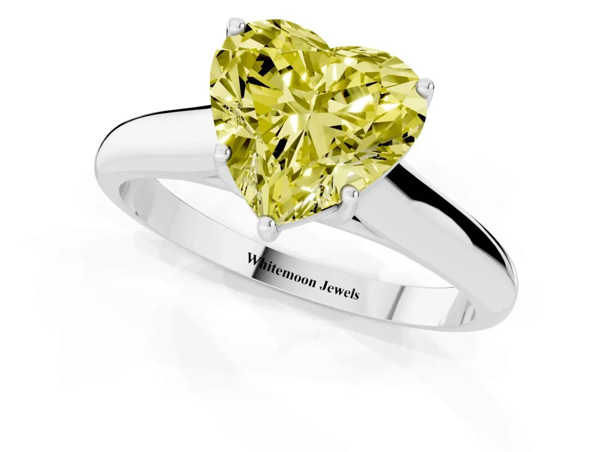Fancy Yellow Heart Cut Cut Diamond Solitaire Engagement Ring with Tapered Plain Band and Four-Prong Setting Platinum