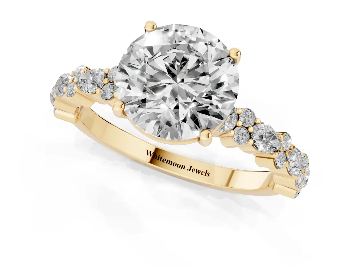 Round Cut Diamond Side Stone Solitaire Ring with Round and Four-Prong Setting Yellow gold