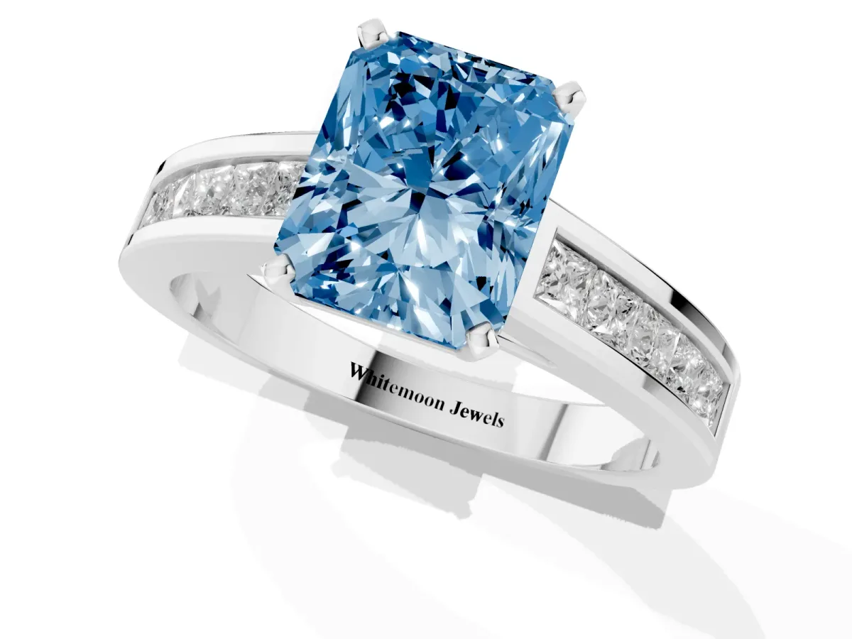 Fancy Blue Radiant Cut Solitaire Diamond Ring with Channel-Set Band and Four-Prong Setting Silver