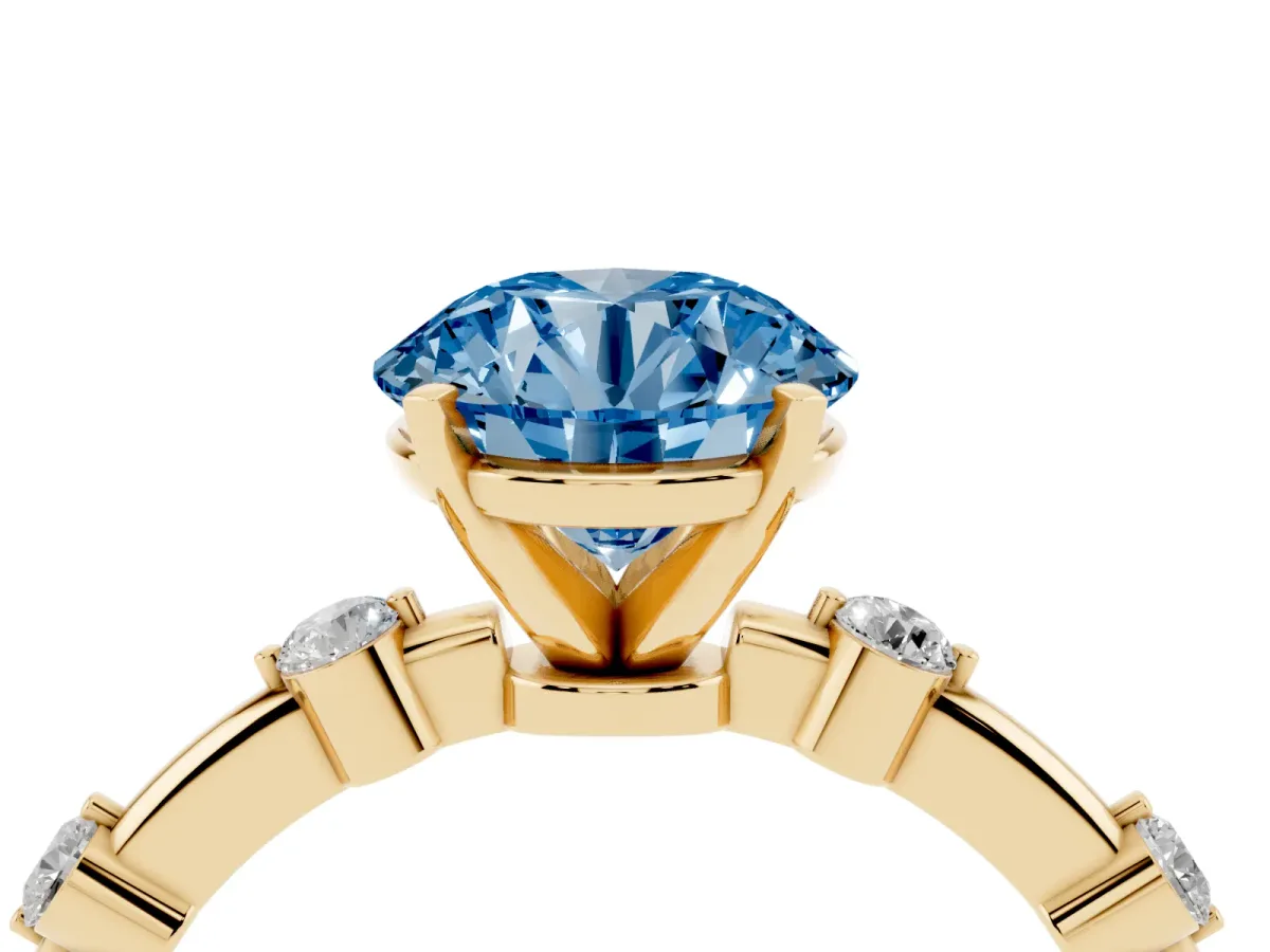 Fancy Blue Round Cut Solitaire Diamond Ring with Bezel Set Side Stones and Prong Setting Yellow gold