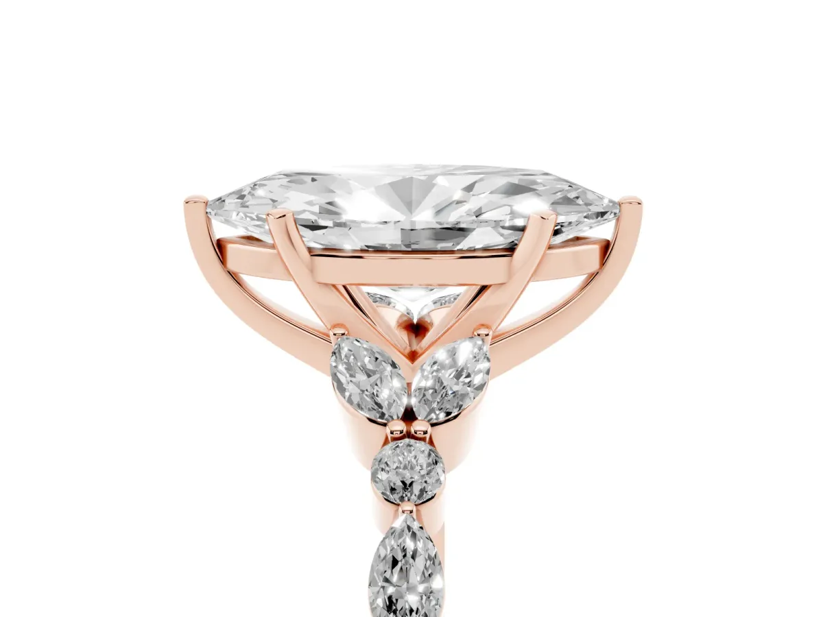Marquise Cut Diamond Solitaire Ring with Side Stones and Four-Prong Setting Rose gold