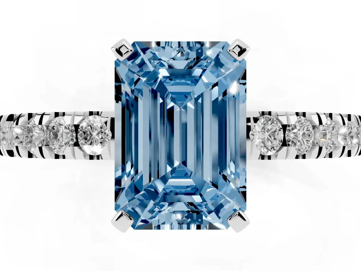 Fancy Blue Emerald Cut Solitaire Diamond with Pavé Band and Four-Prong Setting Silver