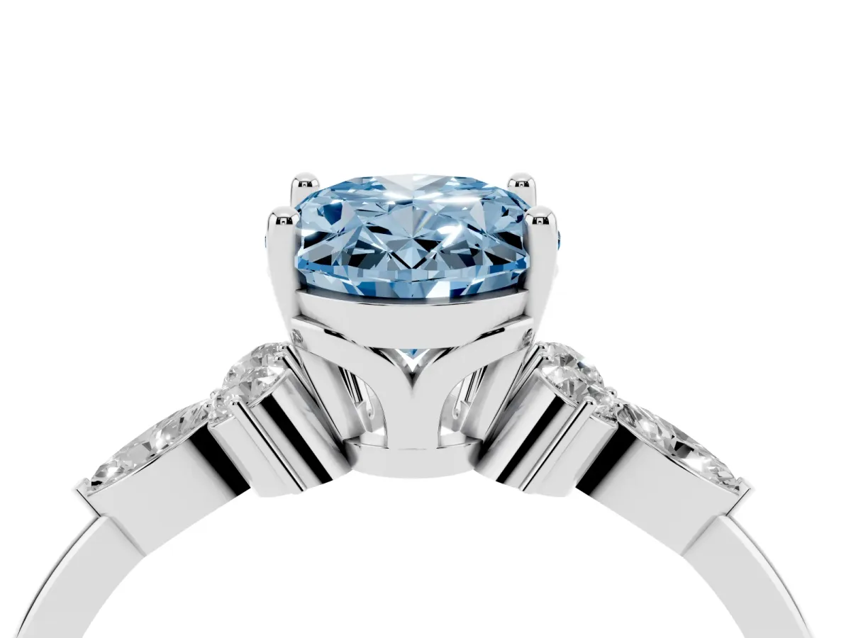 Fancy Blue Oval Cut Brilliant Diamond Solitaire Ring with Pear Side Stones and Four-Prong Setting Silver
