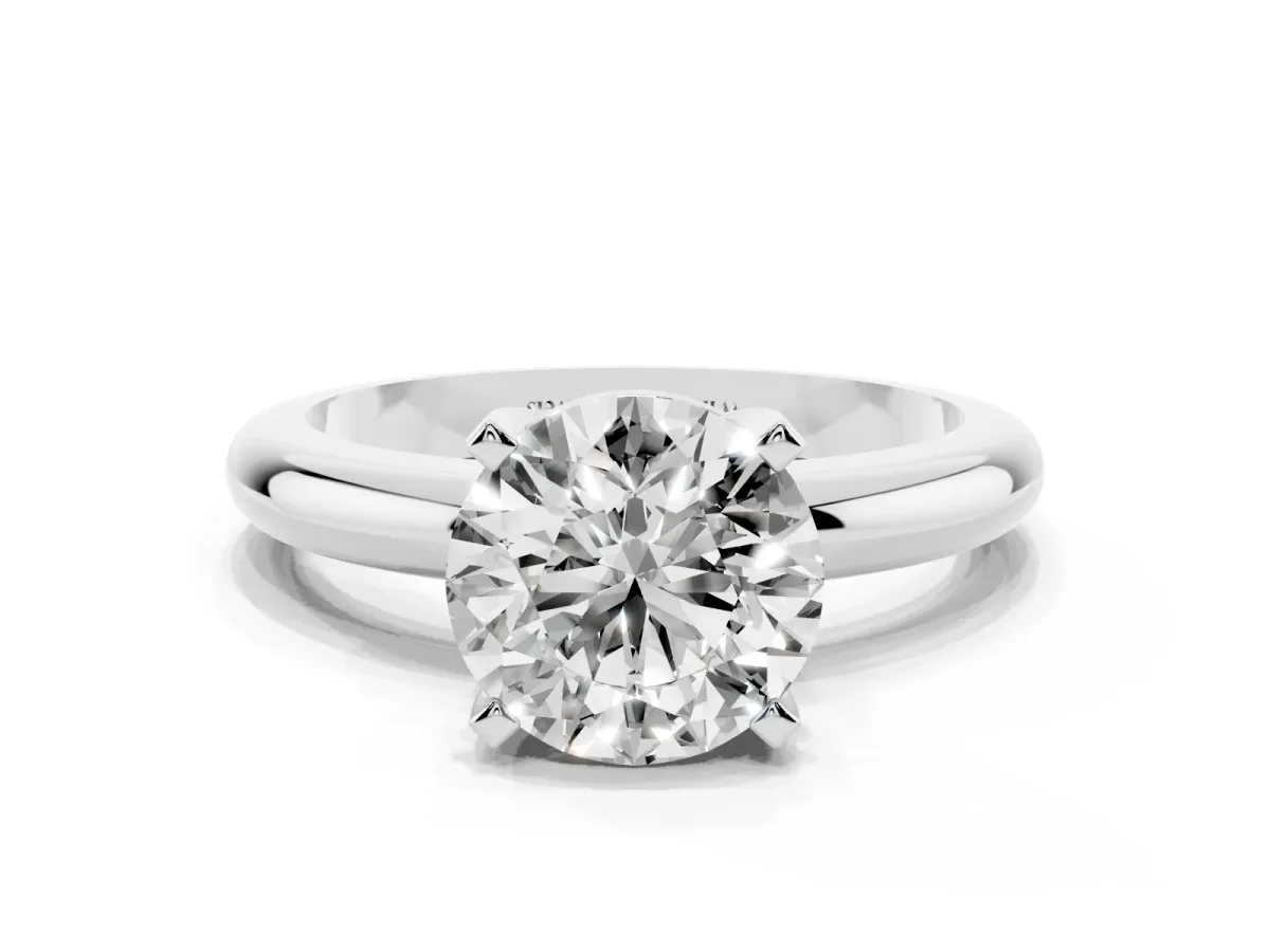 Round Cut Diamond Solitaire Engagement Ring with Round Band and Four-Prong Setting Platinum