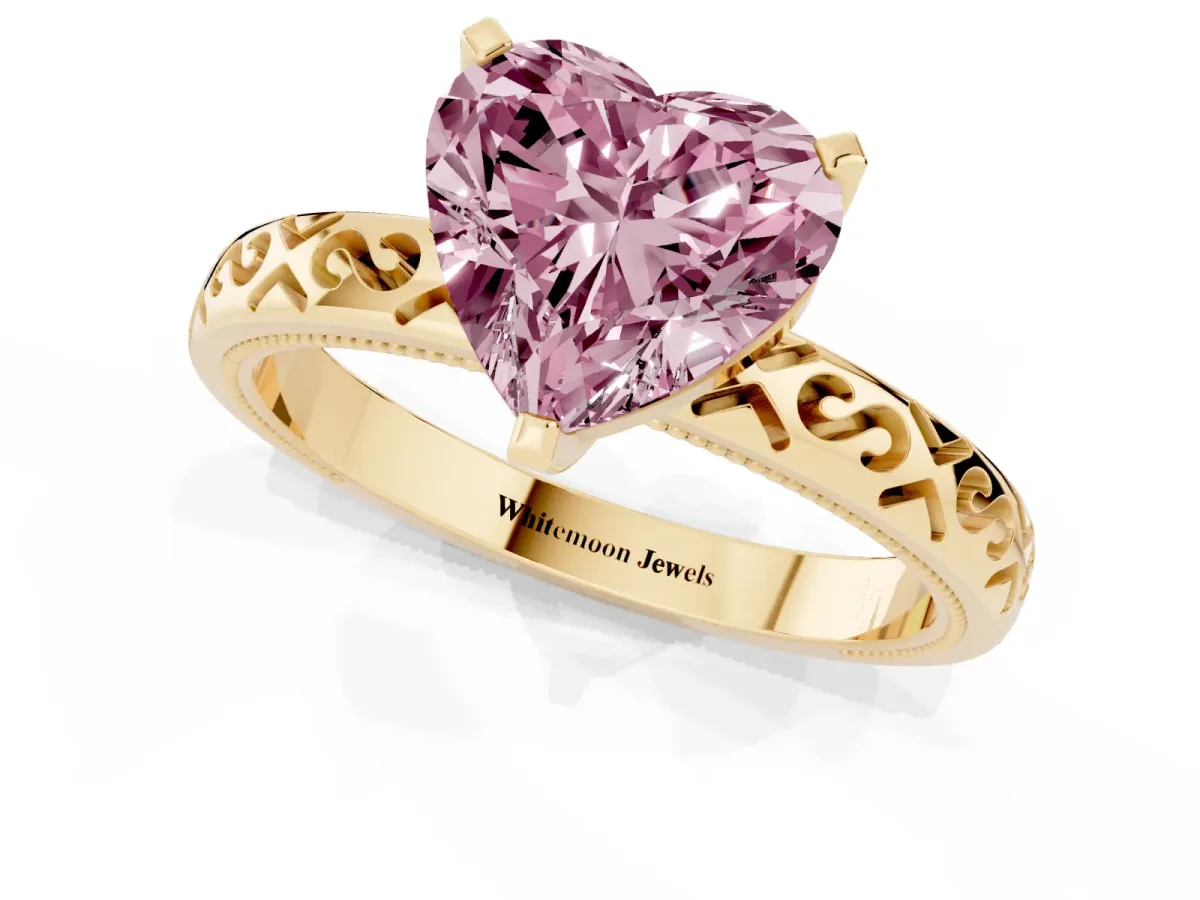 Fancy Pink Heart Cut Solitaire Engagement Ring with Scrollwork Band and Four-Prong Setting Yellow gold