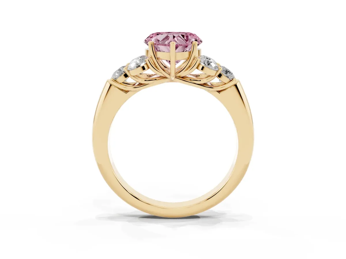 Fancy Pink Heart Cut Cut Diamond Cluster Ring with Round Accent Stones and Prong Setting on a Classic Band Yellow gold
