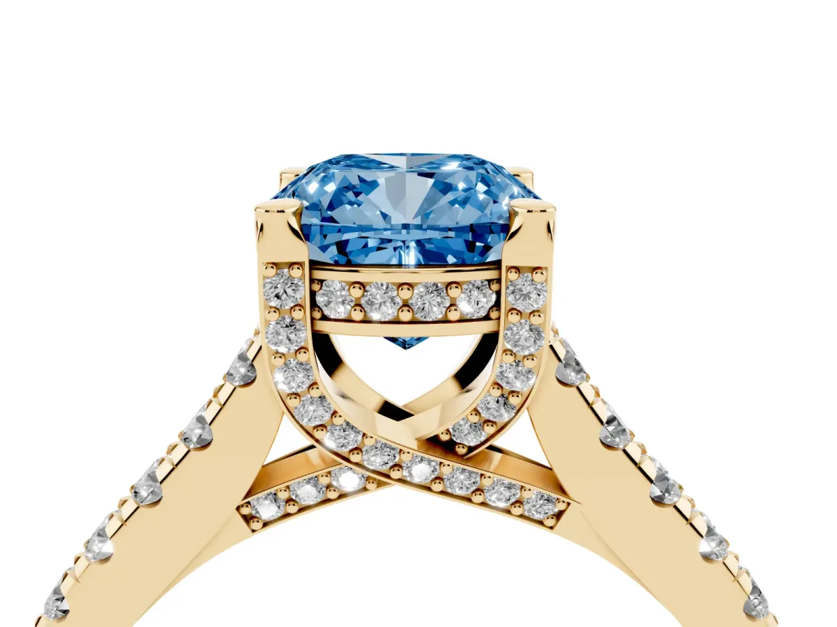 Fancy Blue Cushion Cut Brilliant Diamond Solitaire with Pavé Band and Four-Prong Setting Yellow gold