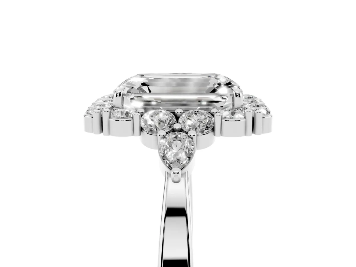 Emerald Cut Diamond Halo Ring with Pear Side Stones and Prong Setting Platinum