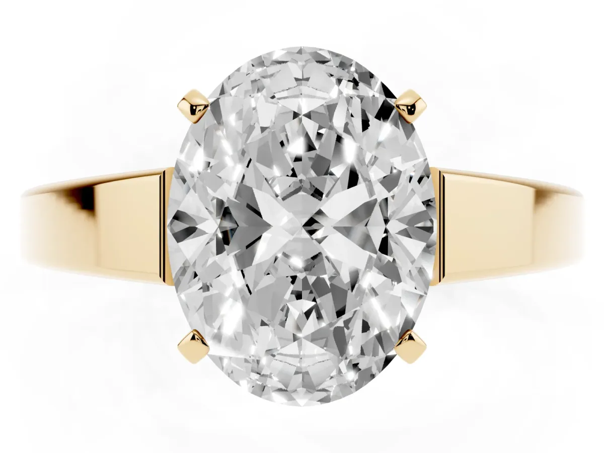 Oval Cut Solitaire Engagement Ring with Four-Prong Setting and Tapered Band Yellow gold