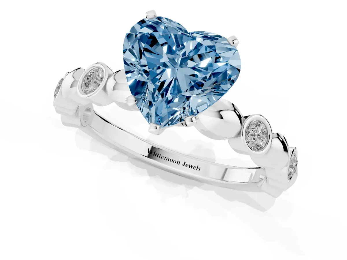 Fancy Blue Heart Cut Solitaire Bezel-Set Diamond Ring with Beaded Band and Four-Prong Setting Silver