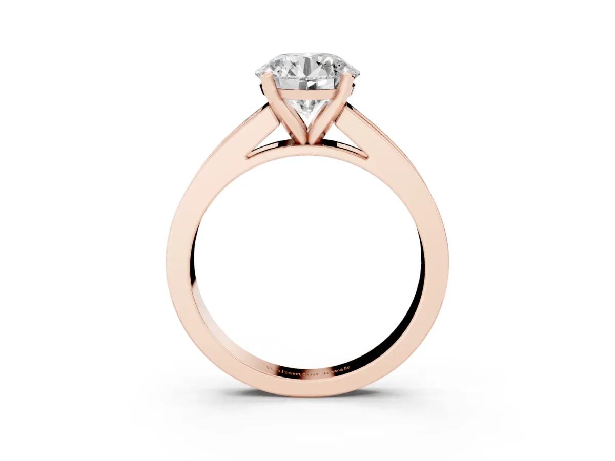 Round Cut Solitaire Diamond Ring with Channel-Set Band and Four-Prong Setting Rose gold