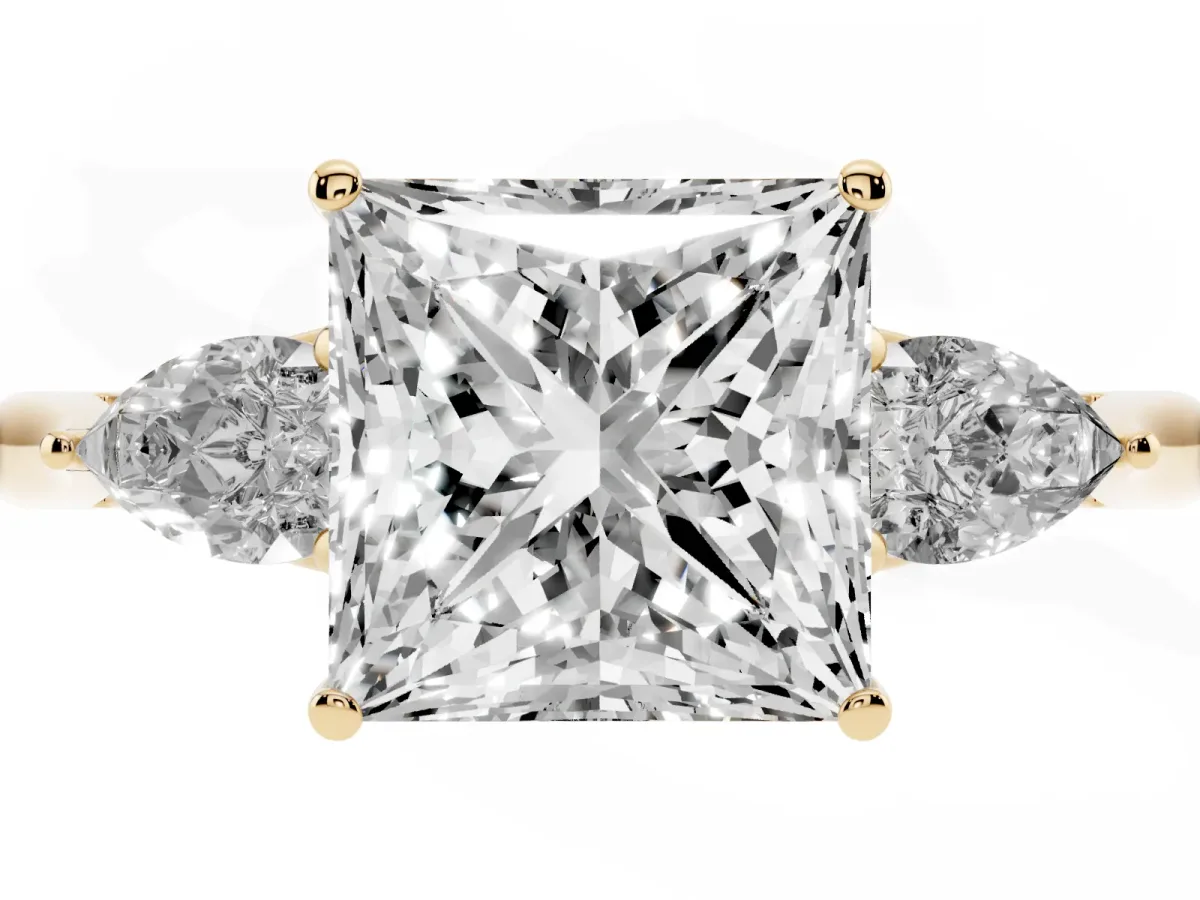 Princess Cut Diamond Three-Stone Ring with Pear Side Stones and Prong Setting Yellow gold