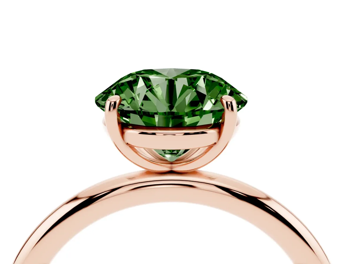 Fancy Green Round Cut Solitaire Diamond Ring with Four-Prong Setting on a Plain Band Rose gold