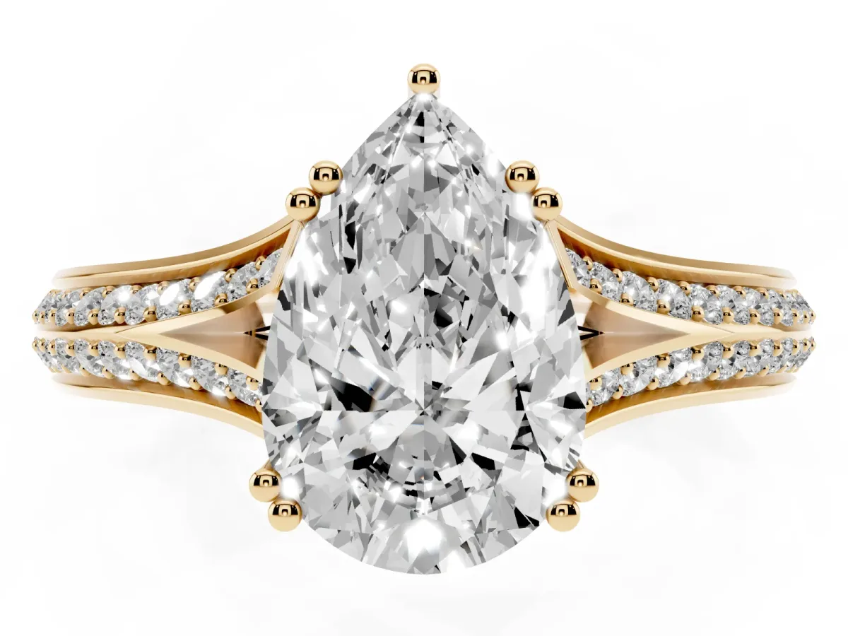Pear Cut Diamond Split Shank Engagement Ring with Pavé Band Yellow gold