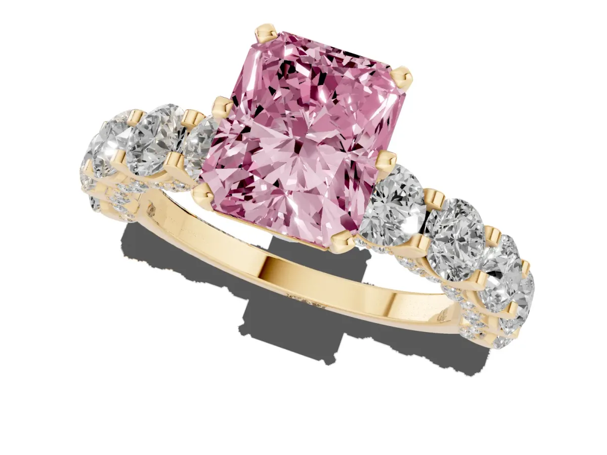 Fancy Pink Radiant Cut Diamond Side Stone Engagement Ring with Four-Prong Setting Yellow gold