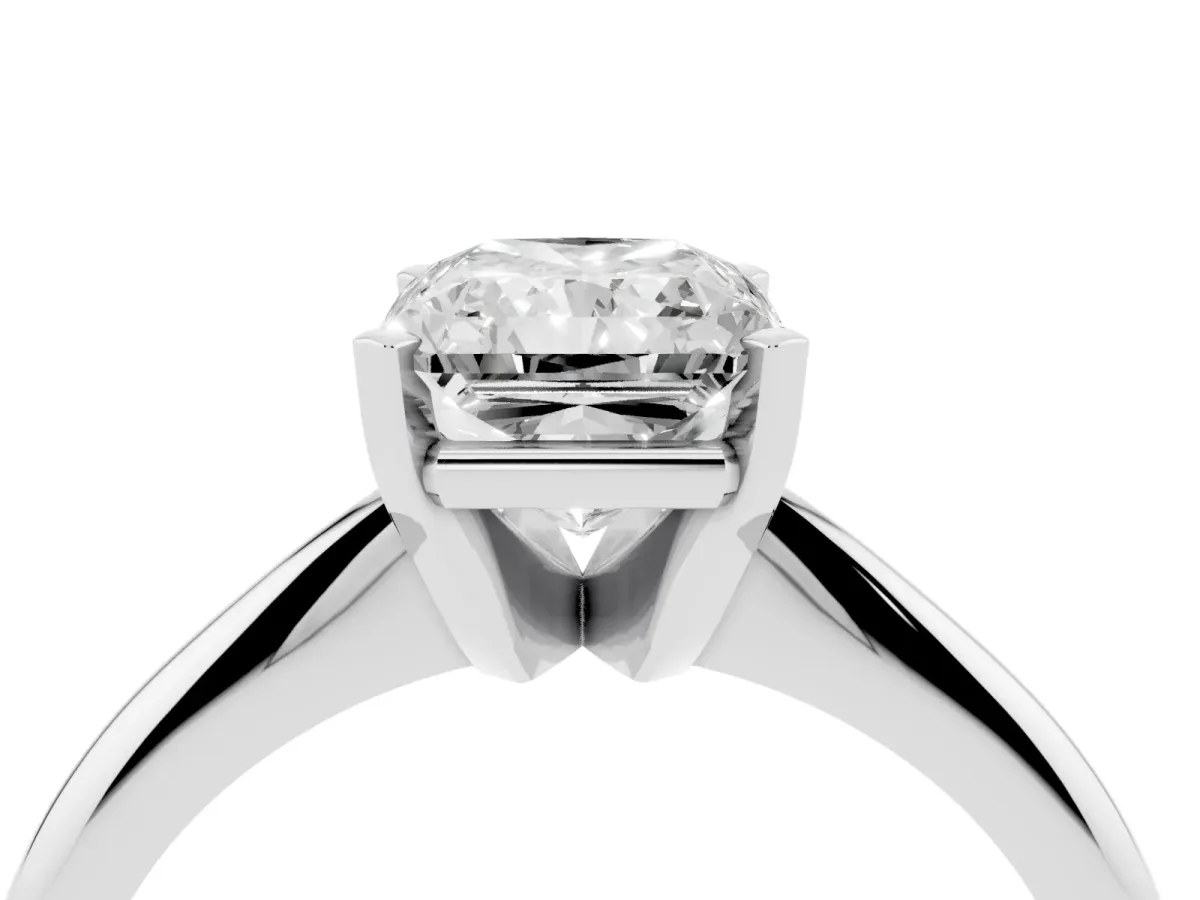 Radiant Cut Cut Solitaire Ring with Four-Prong Setting on a Classic Band Platinum