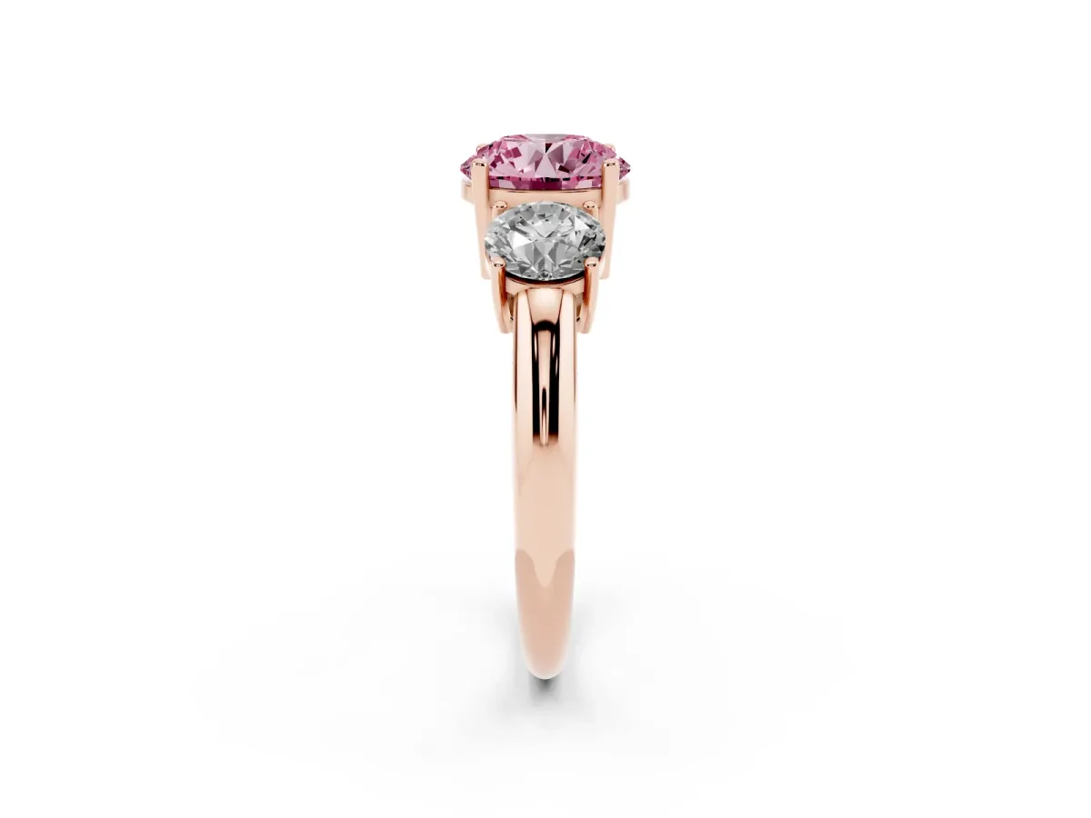 Fancy Pink Three-Stone Round Cut Cut Diamond Engagement Ring with Prong Setting on a White Gold Band Rose gold