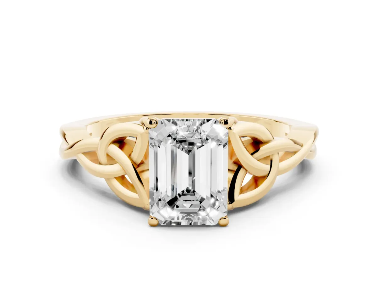 Emerald Cut Diamond Solitaire Engagement Ring with Celtic Knot Band and Four-Prong Setting Yellow gold