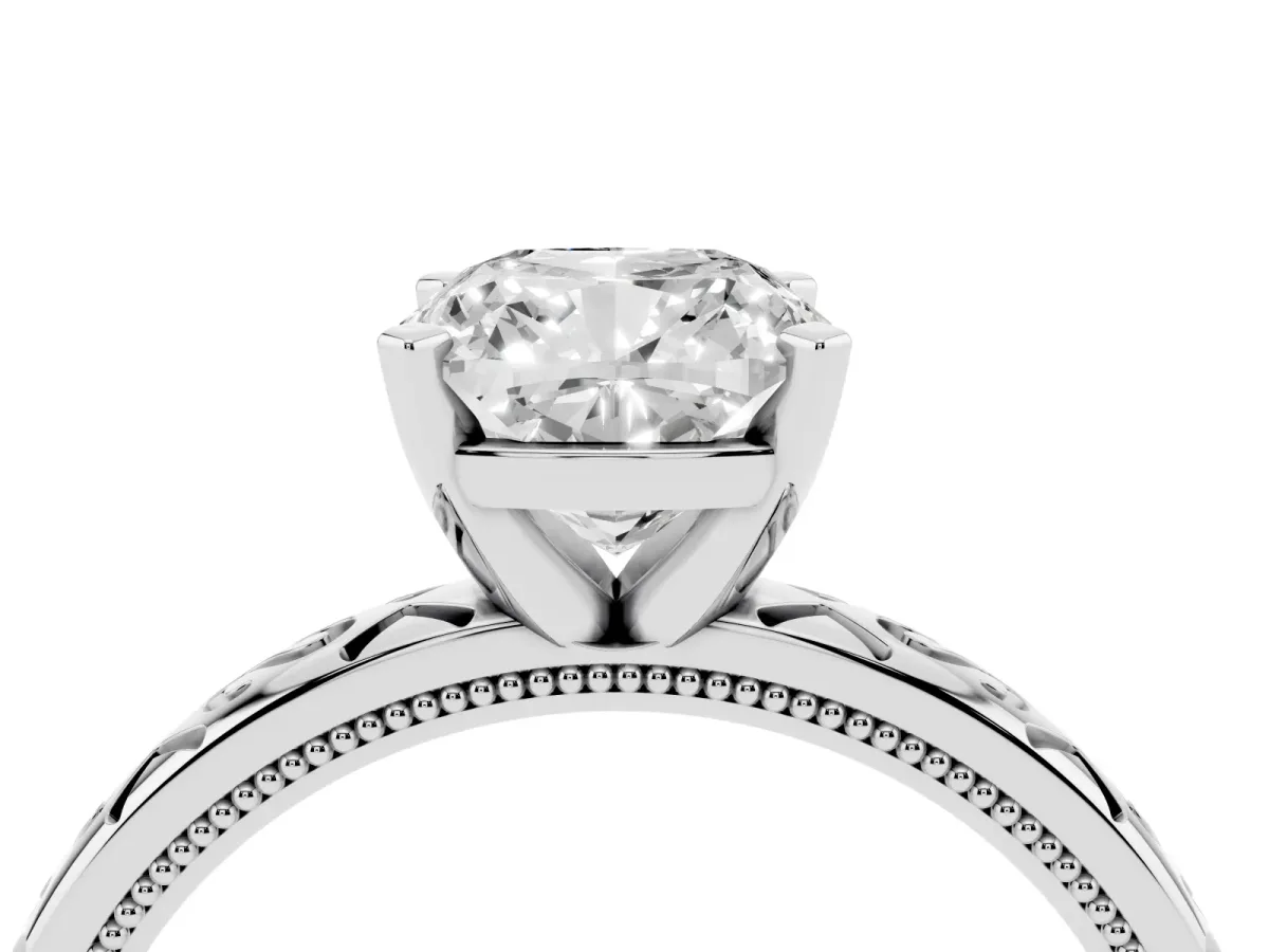 Cushion Cut Solitaire Engagement Ring with Scrollwork Band and Four-Prong Setting Platinum