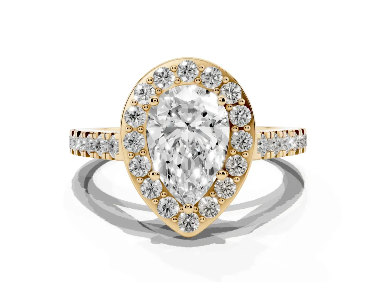 Pear Cut Diamond Halo Ring with Round Pavé Split Shank and Prong Setting Yellow gold