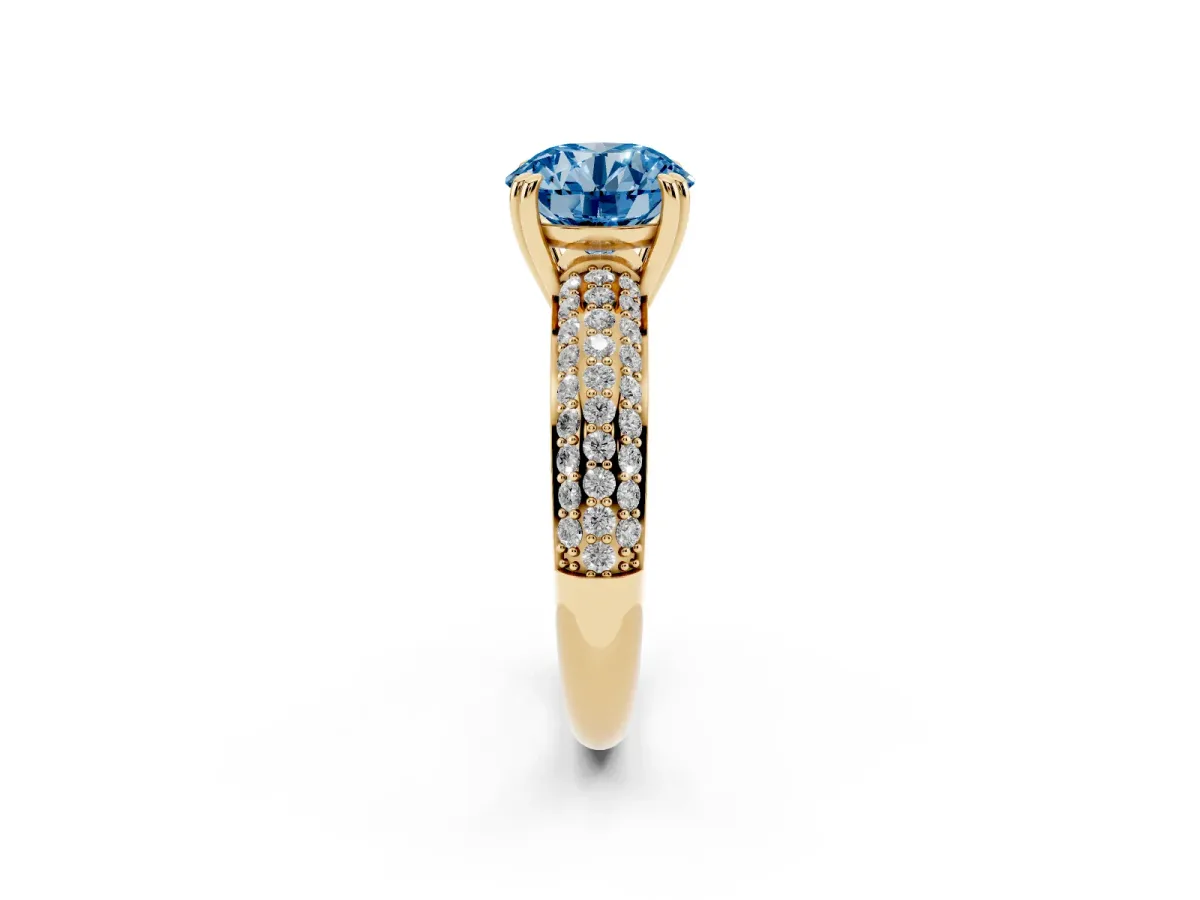 Fancy Blue Round Cut Diamond Solitaire Ring with Multi-Row Round Pavé Band and Prong Setting Yellow gold