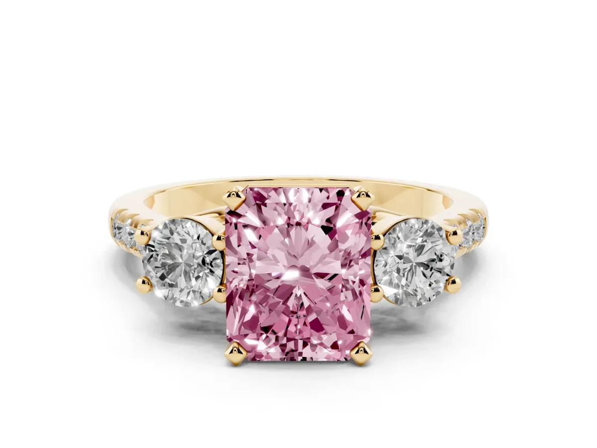 Fancy Pink Three-Stone Radiant Cut Diamond Pavé Band with Four-Prong Setting Yellow gold
