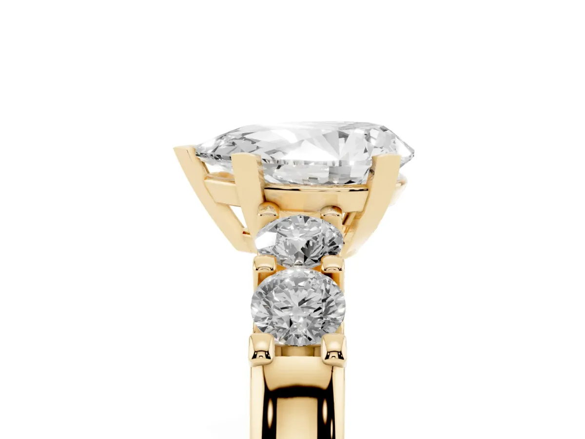 Pear Cut Brilliant Cut Diamond Five-Stone Prong Set Engagement Ring with Channel Band Yellow gold