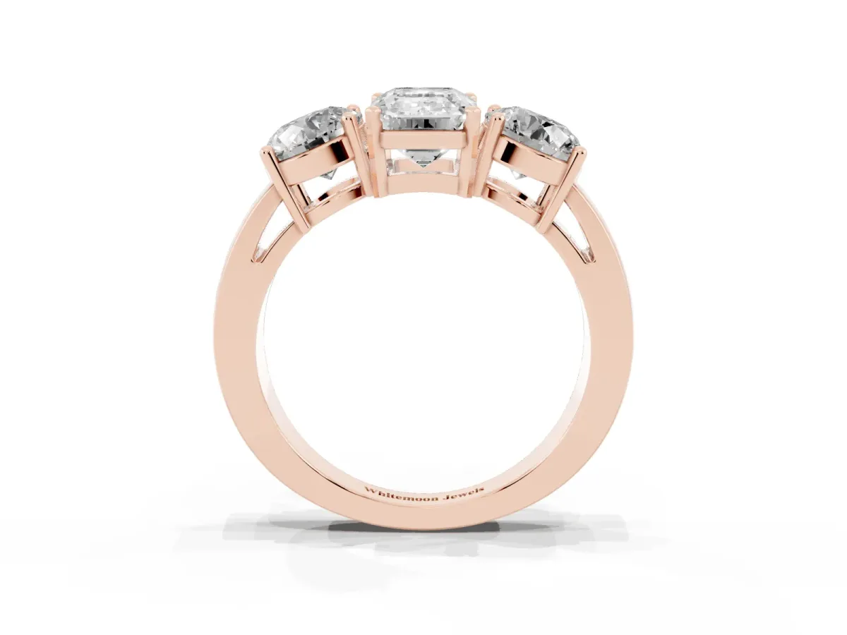 Three-Stone Emerald Cut Diamond Ring with Round Side Stones, Classic Band, and Four-Prong Setting Rose gold