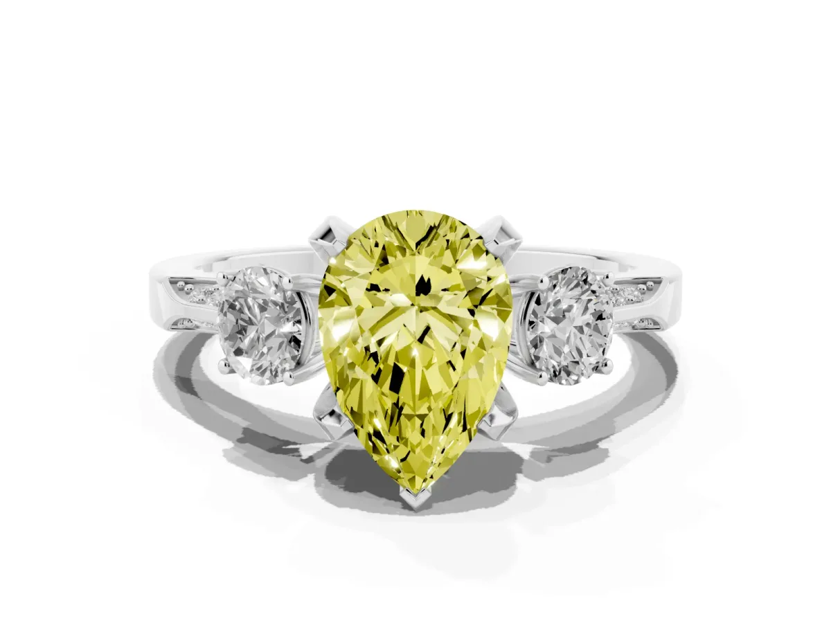 Fancy Yellow Pear Cut Brilliant Three-Stone Diamond Ring with Pavé Band and Four-Prong Setting Platinum