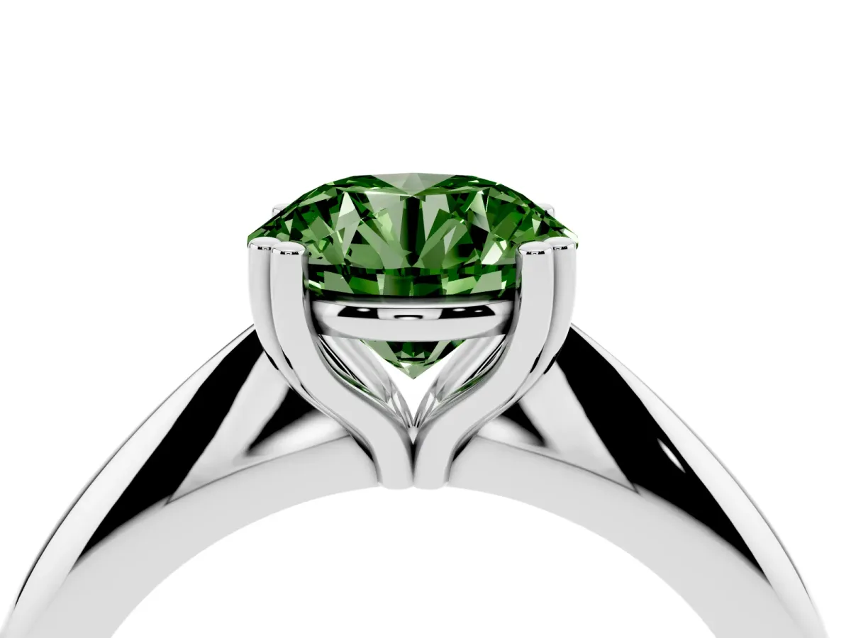 Fancy Green Round Cut Cut Solitaire Engagement Ring with Tapered Band and Four-Prong Setting Silver