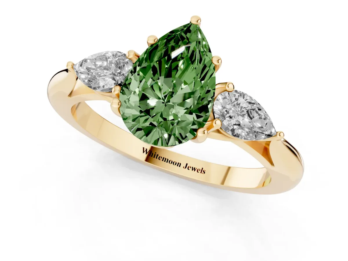 Fancy Green Pear Cut Diamond Three-Stone Ring with Pear Side Stones and Prong Setting Yellow gold