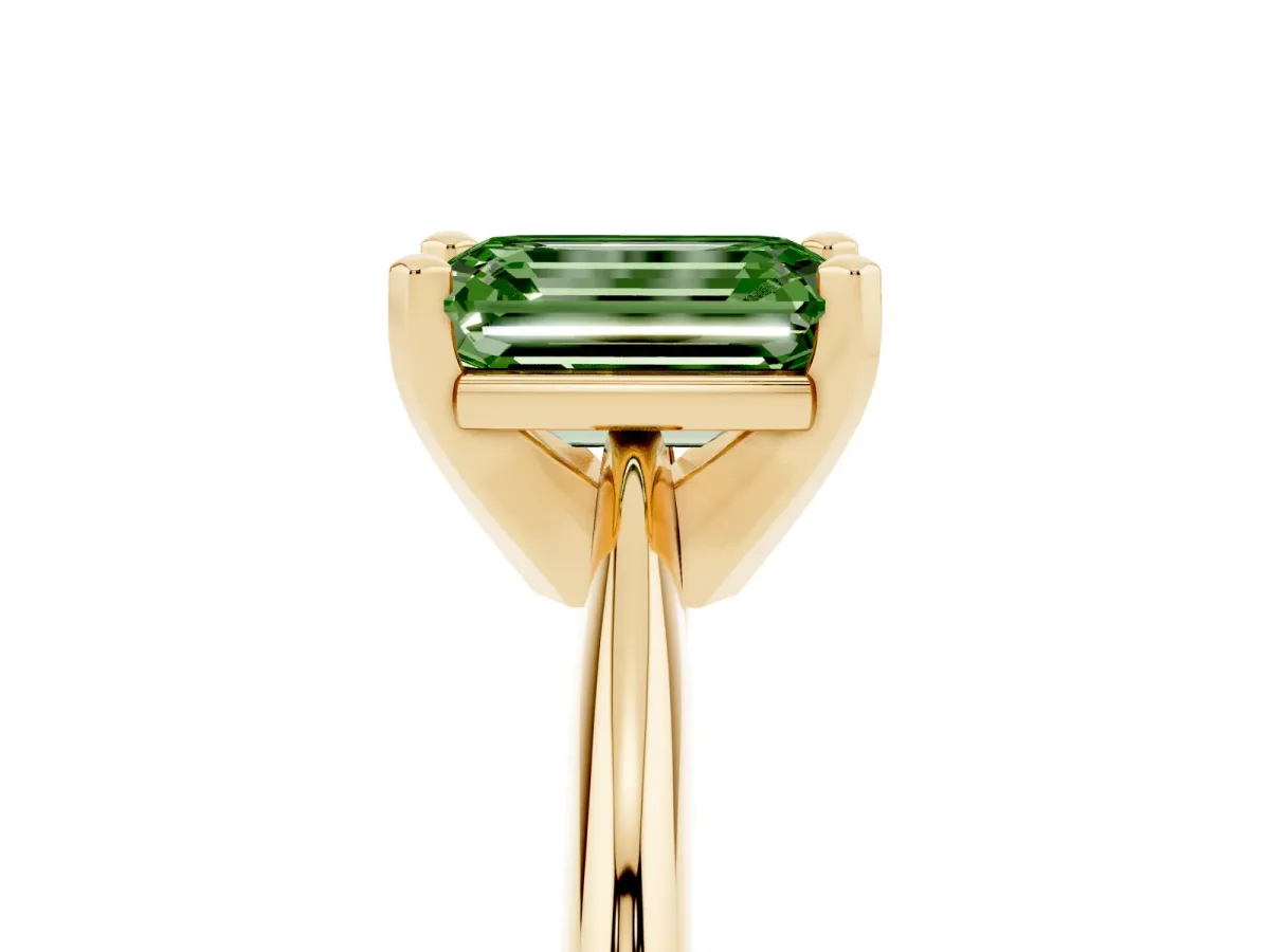 Fancy Green Emerald Cut Cut Solitaire Ring with Four-Prong Setting on a Classic Band Yellow gold