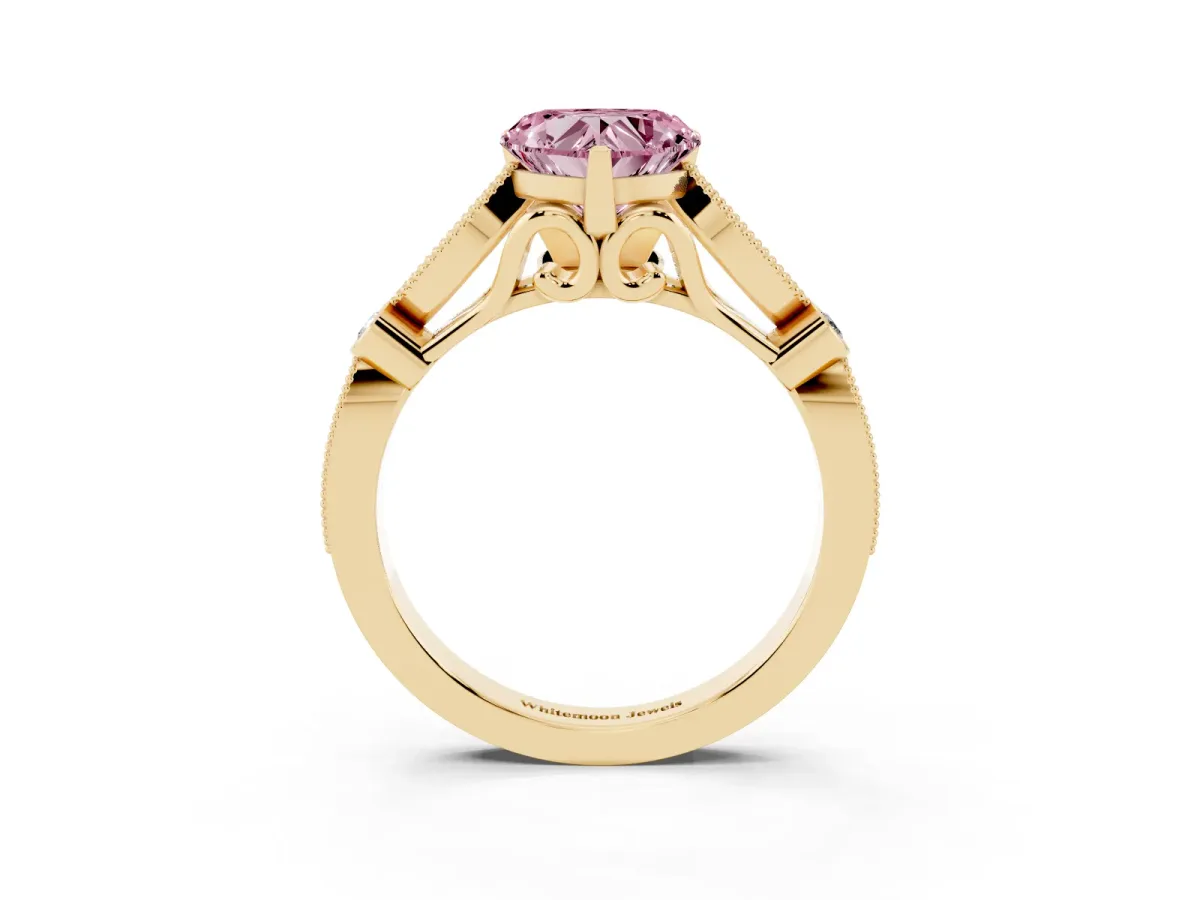 Fancy Pink Heart Cut Cut Diamond with Milgrain Marquise and Bezel Accents on a Solitaire Band with Prong Setting Yellow gold
