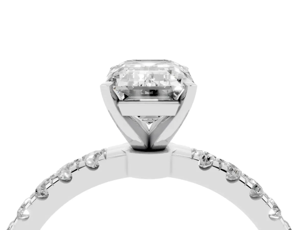 Emerald Cut Diamond Solitaire Ring with Pavé Accents and Four-Prong Setting Silver