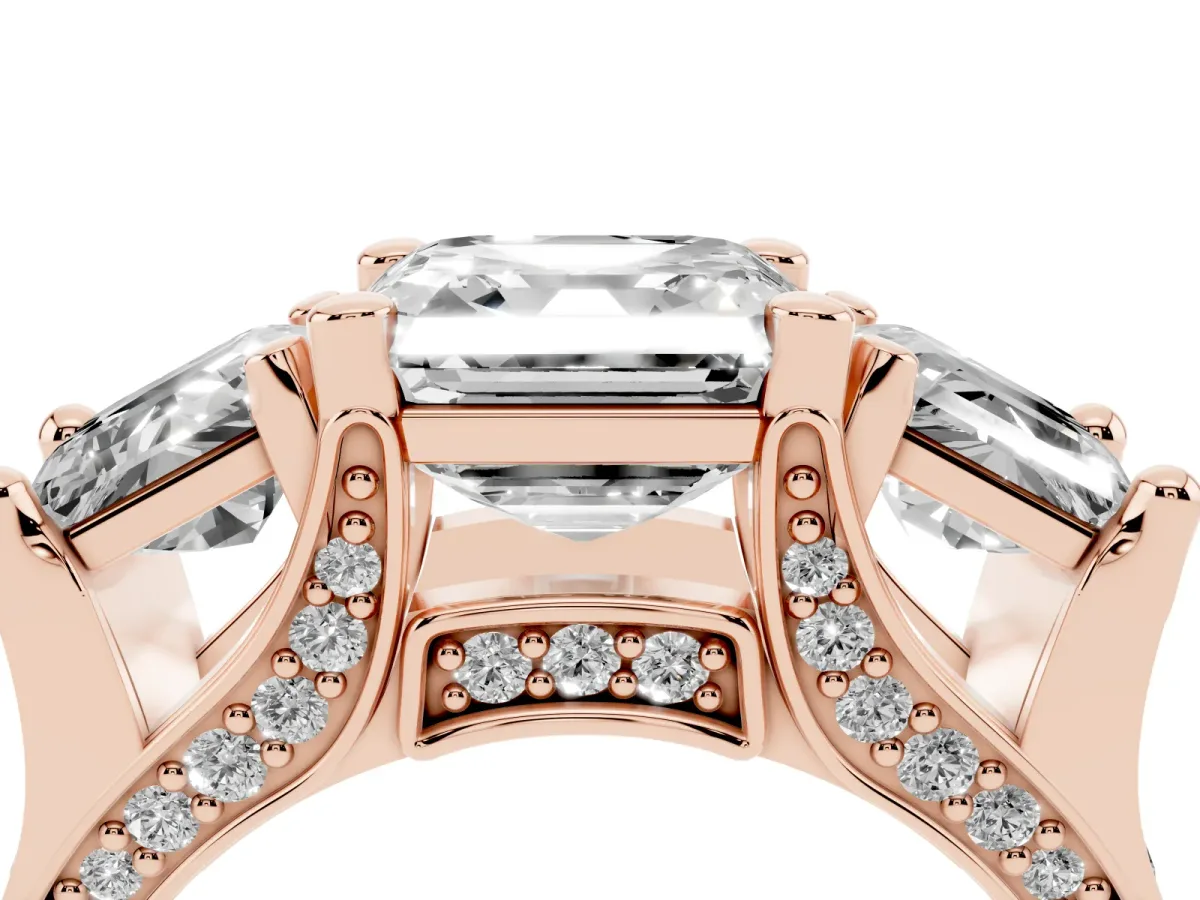 Asscher Cut Diamond Three-Stone Ring with Channel Set Band and Four-Prong Setting Rose gold