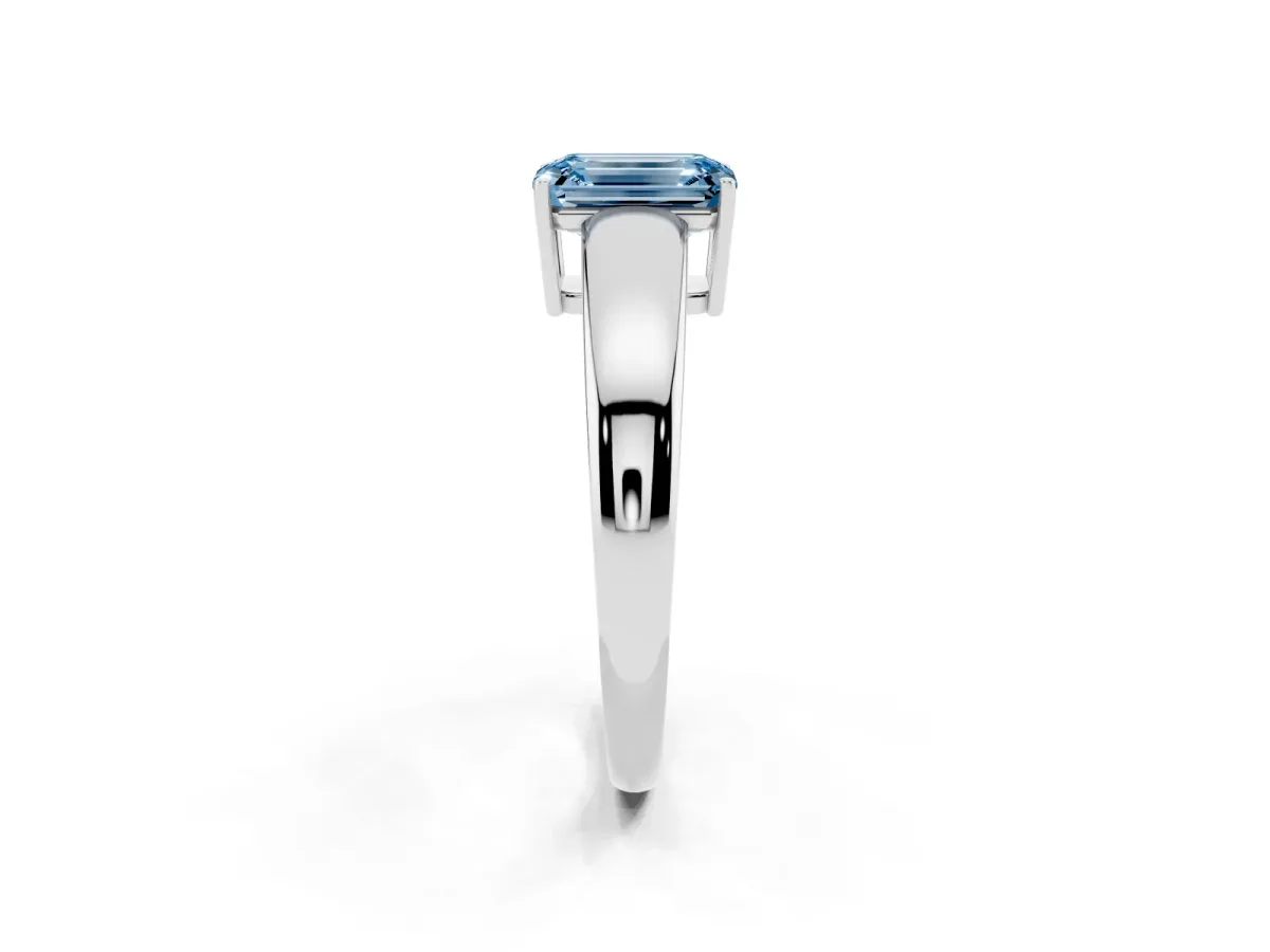 Fancy Blue Emerald Cut Solitaire Diamond Ring with Tapered Band and Four-Prong Setting Platinum