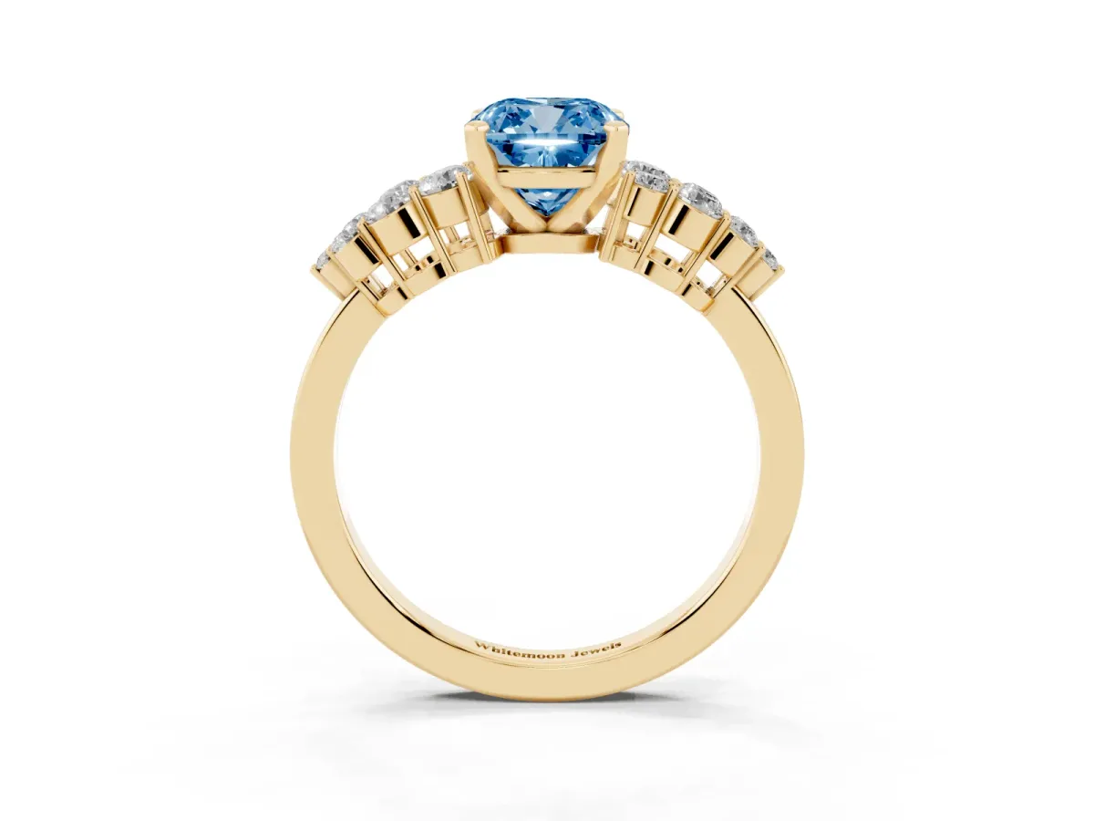 Fancy Blue Cushion Cut Cluster Diamond Engagement Ring with Pavé Band and Four-Prong Setting Yellow gold
