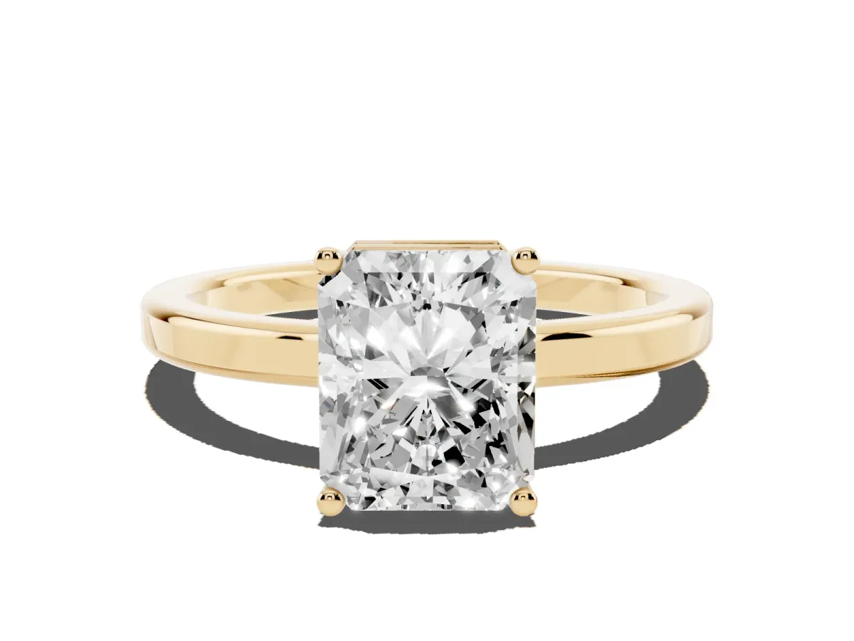 Radiant Cut Cut Solitaire Engagement Ring with Four-Prong Setting on a Classic Band Yellow gold