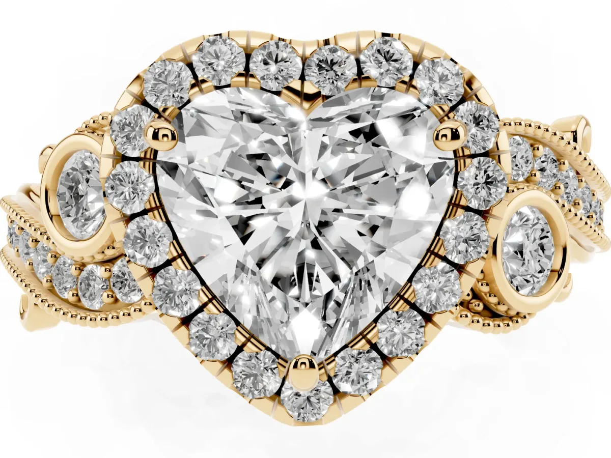 Heart Cut Halo Diamond Ring with Milgrain and Bezel Accents on a Split Shank Band Yellow gold